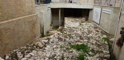 The Flattened Houses Beneath The Wall