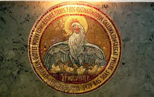 Mosaic of a hen protecting her chicks at Dominus Flevit